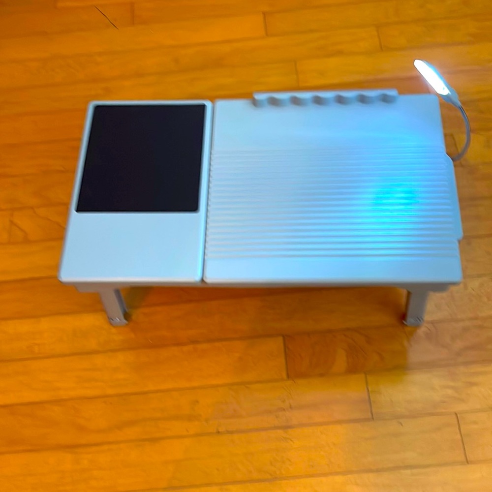 Computer laptop holder when sitting or in bed light connection battery operated